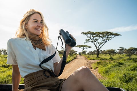 Traveler with binoculars